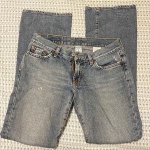 Lucky Brand women’s jeans. Bootcut. Small rips. Size 2